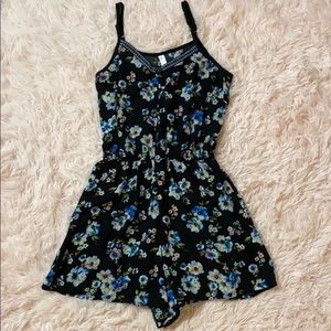 Black floral romper with buttons